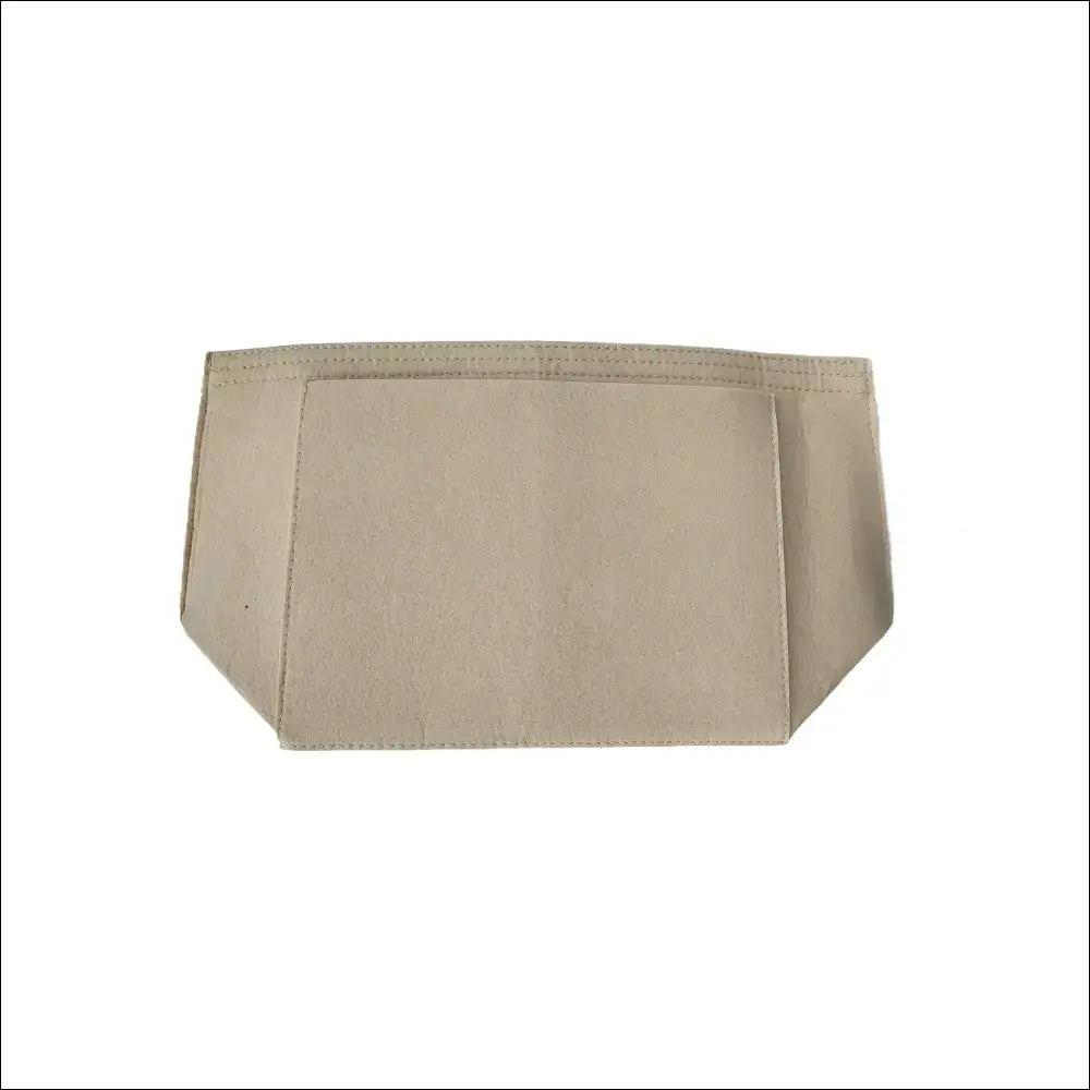 Longchamp handväskorganiserare i beige konstfilt med fack och ergonomisk form för effektiv förvaring i din väska.