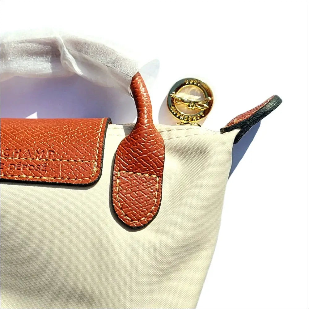 Longchamp Le Pliage Pochette Paper White med handtag - Mini single pack - Design handväska