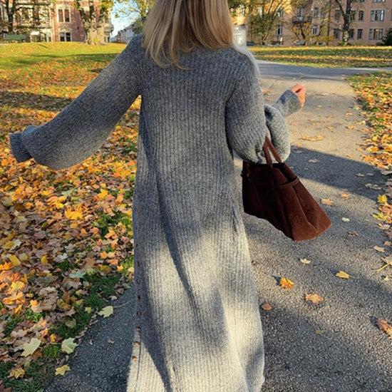 Stickad klänning kofta med ballongärmar för elegant kontorsstil - mutual