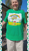 T-shirt with a camper under a rainbow and flower power design