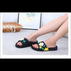 Sommarens favorit: Svarta sandaler med blomsterdesign - Sandaler dam