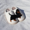 White slippers with black dachshund dog pattern for a cozy look